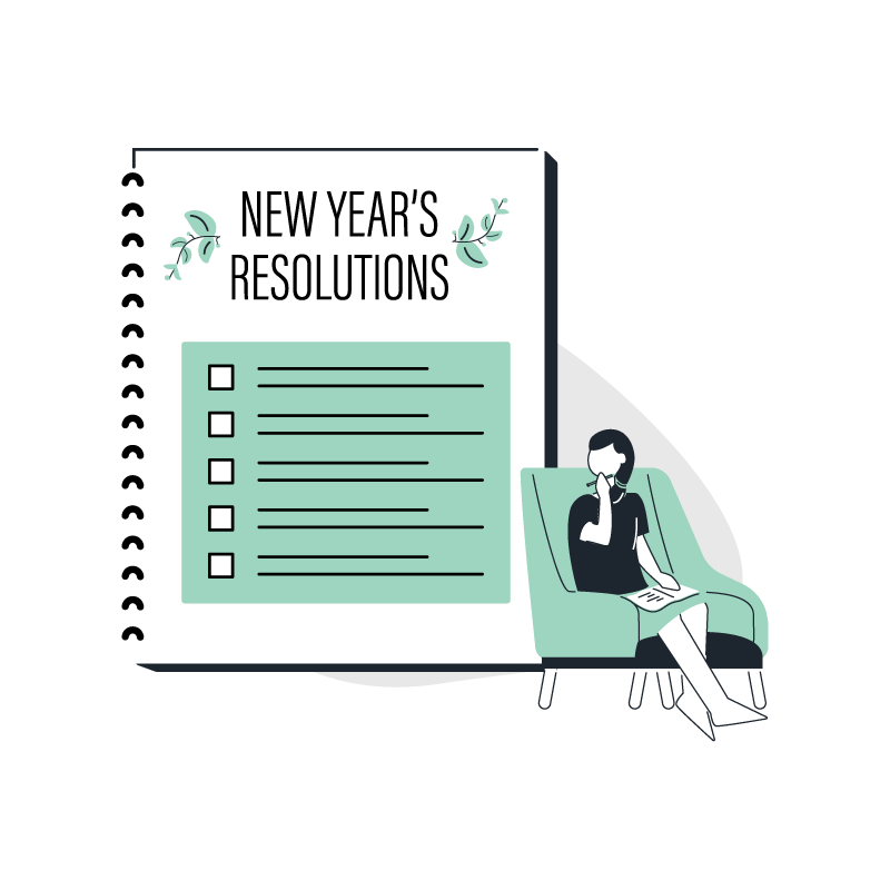 a woman writing new year's resolutions