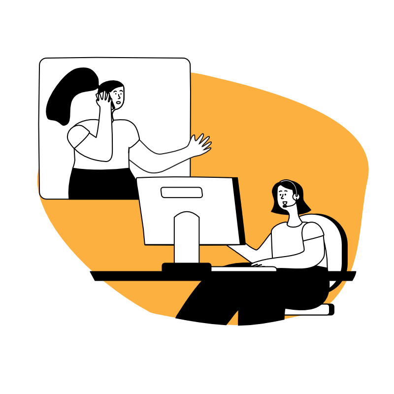 a woman sitting at a computer and talking to another woman on the phone